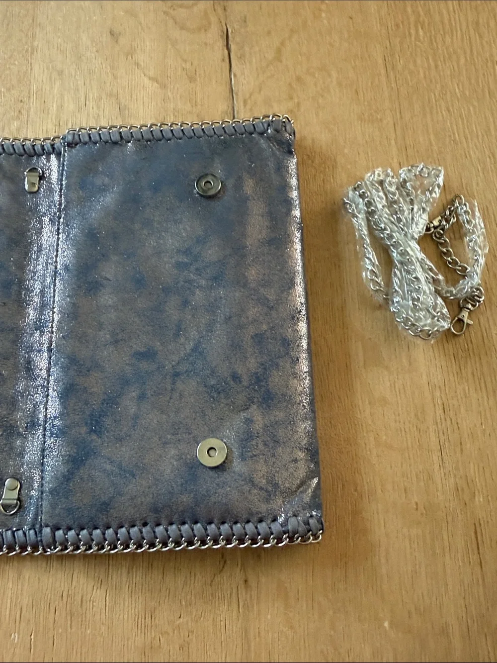 Phaser Purplish Gray Metallic Leather Crossbody Clutch with Chain Trim
